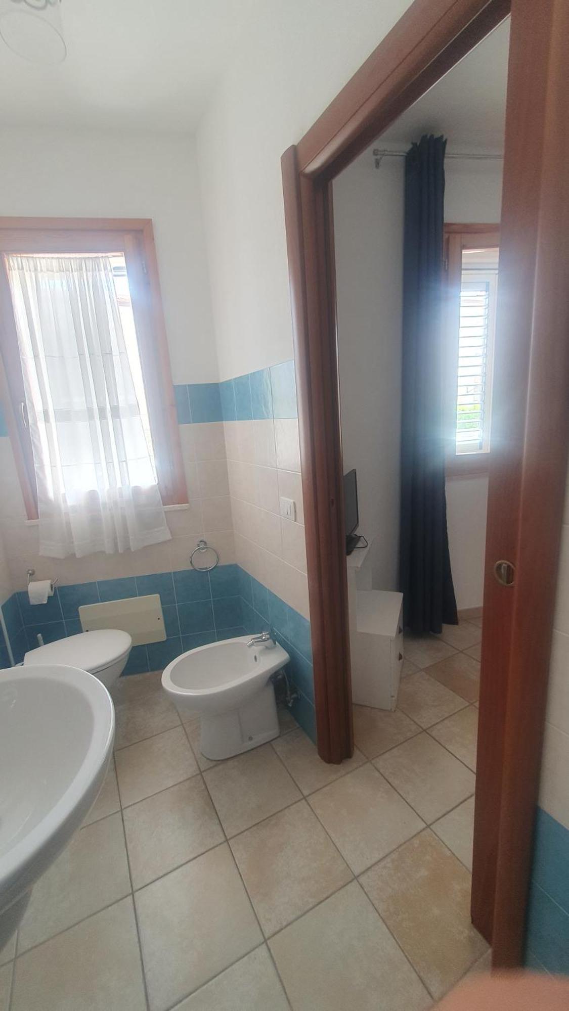Blue Dolphin Guest House Альгеро Екстер'єр фото