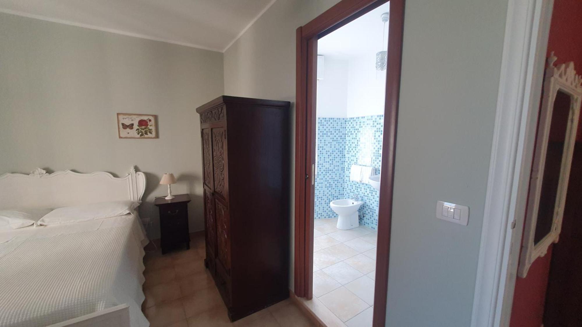 Blue Dolphin Guest House Альгеро Екстер'єр фото